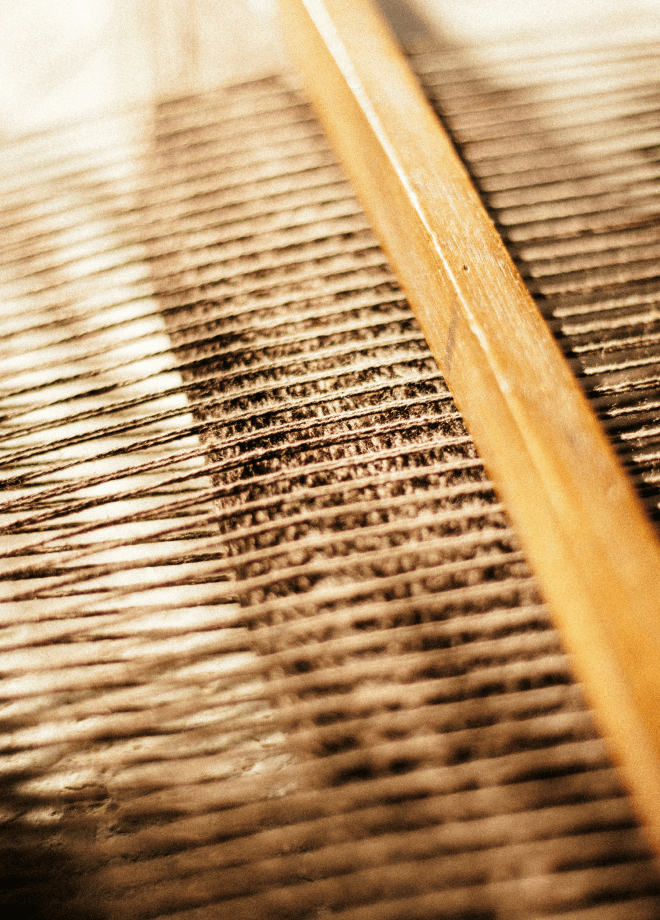 Close-up of woven fabric on loom